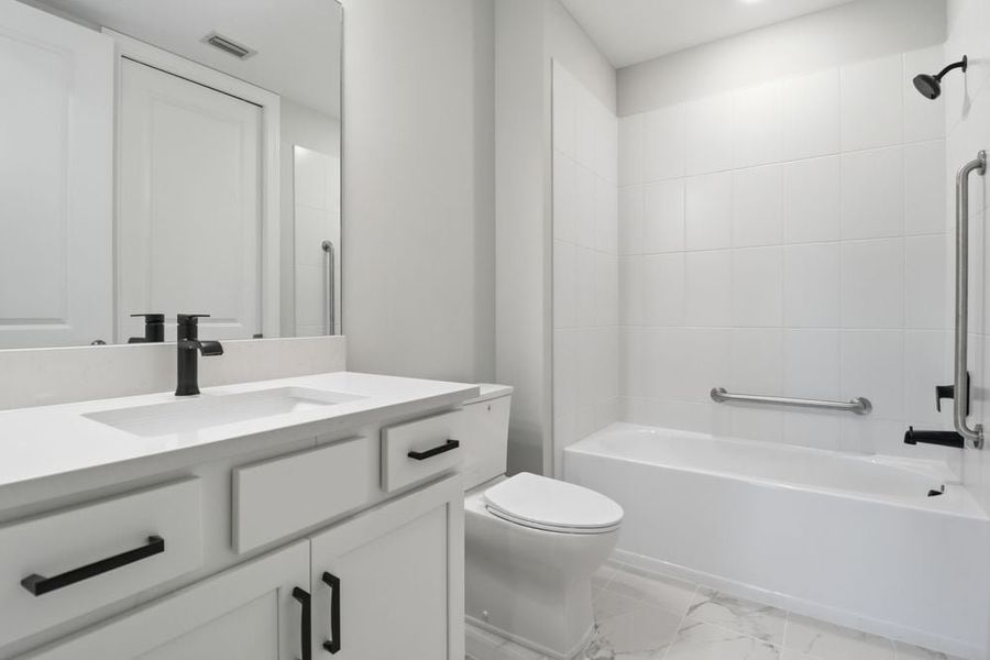 Furnished interior view inside a new home in Esplanade by the Islands Coach Homes, Naples (Image 9).