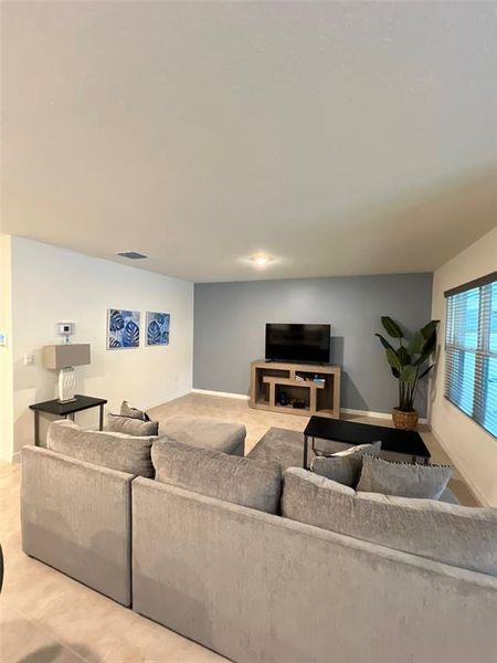 Furnished interior view inside a new home in Charles Cove, Davenport (Image 4).
