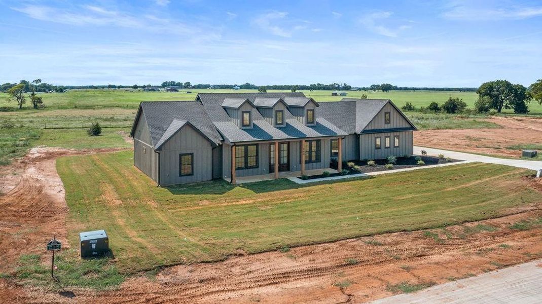 Front exterior of a new home in , Whitesboro, TX, highlighting curb appeal (Image 2). Front exterior of a new home in , Whitesboro, TX, highlighting curb appeal (Image 2).