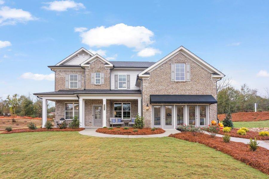 Front exterior of a new home in Ellorie Estates, Dawsonville, GA, highlighting curb appeal (Image 1). Front exterior of a new home in Ellorie Estates, Dawsonville, GA, highlighting curb appeal (Image 1).