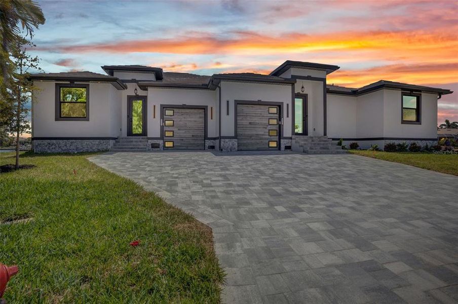 Front exterior of a new home in , Punta Gorda, FL, highlighting curb appeal (Image 20).