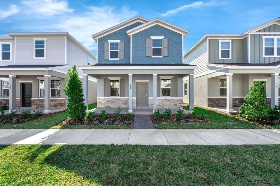 Front exterior of a new home in Brack Ranch, St. Cloud, FL, highlighting curb appeal (Image 20). Front exterior of a new home in Brack Ranch, St. Cloud, FL, highlighting curb appeal (Image 20).