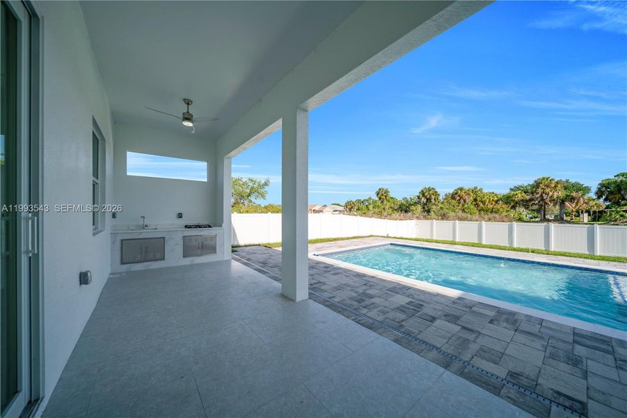 Exterior details and patio area of a home in , Lehigh Acres (Image 4).