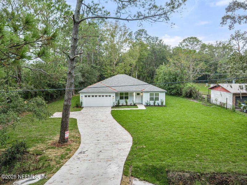 Front exterior of a new home in , Jacksonville, FL, highlighting curb appeal (Image 2). Front exterior of a new home in , Jacksonville, FL, highlighting curb appeal (Image 2).