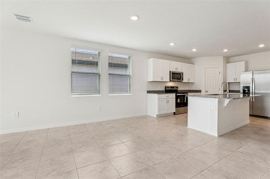 Furnished interior view inside a new home in Lawson Dunes - Signature Series, Haines City (Image 5).
