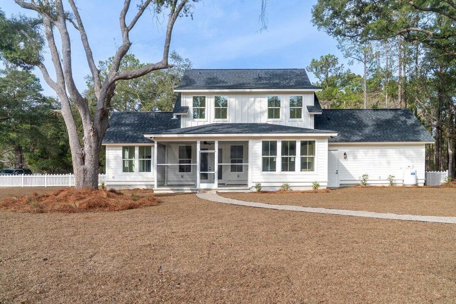 Exterior details and patio area of a home in , Awendaw (Image 33).