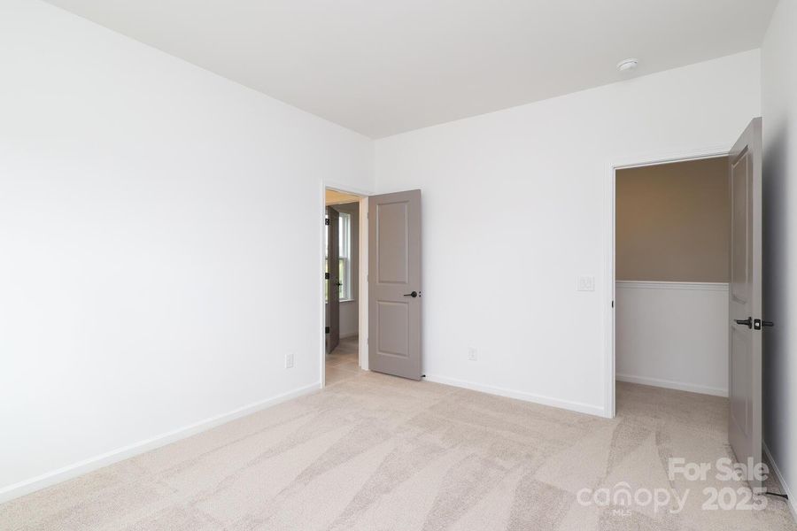 Spacious, unfurnished interior of a new home in Estates at Sugar Creek, Indian Land (Image 31).