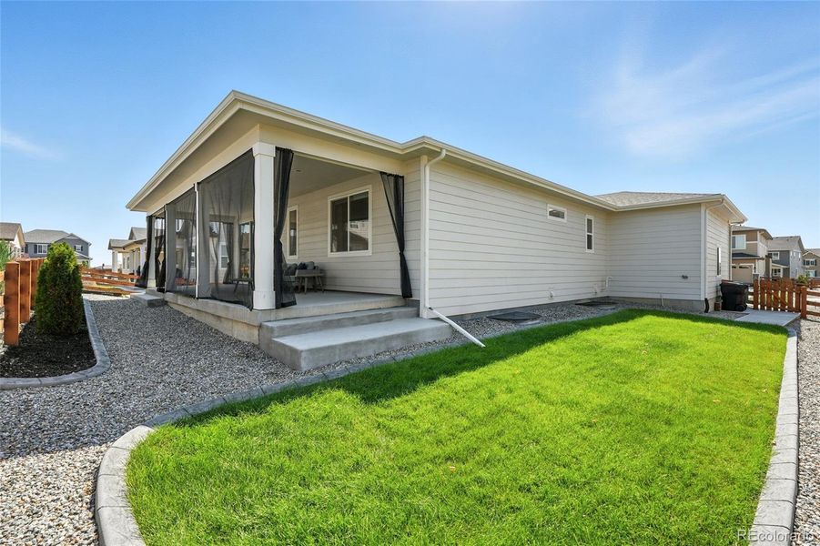 Front exterior of a new home in Creekside Village, Thornton, CO, highlighting curb appeal (Image 25).