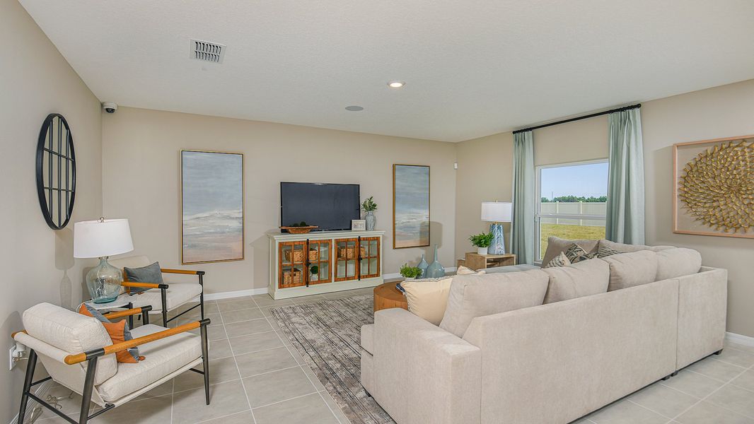 Representative furnished interior of a home built from the Cardinal by Taylor Morrison in Solena, North Fort Myers (Image 5).