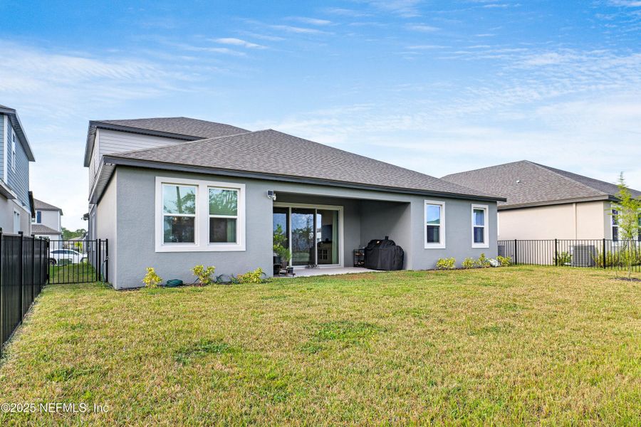 Exterior details and patio area of a home in Legends Preserve - Reserve Series, Daytona Beach (Image 3).