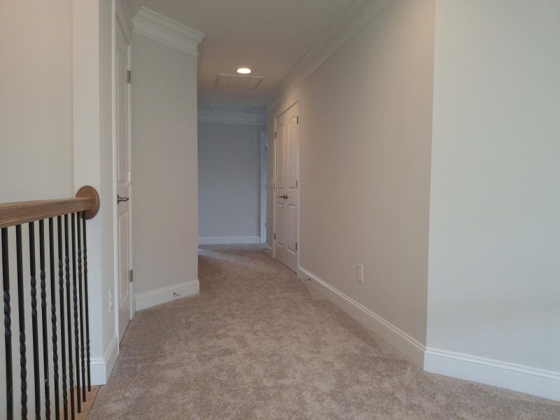 Spacious, unfurnished interior of a new home in Weybridge, Burlington (Image 49).