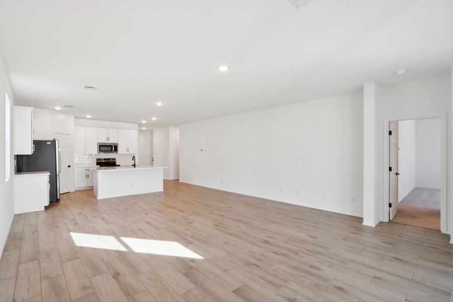 Great room, dining and kitchen