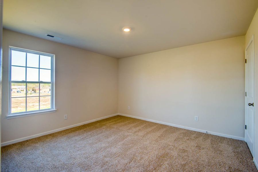 Representative unfurnished interior of a home built from the Penwell by D.R. Horton in Carter Ridge, Greenville (Image 22).