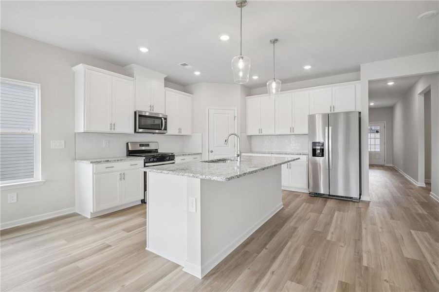 Furnished interior view inside a new home in Northwoods at Mirror Lake, Villa Rica (Image 18).