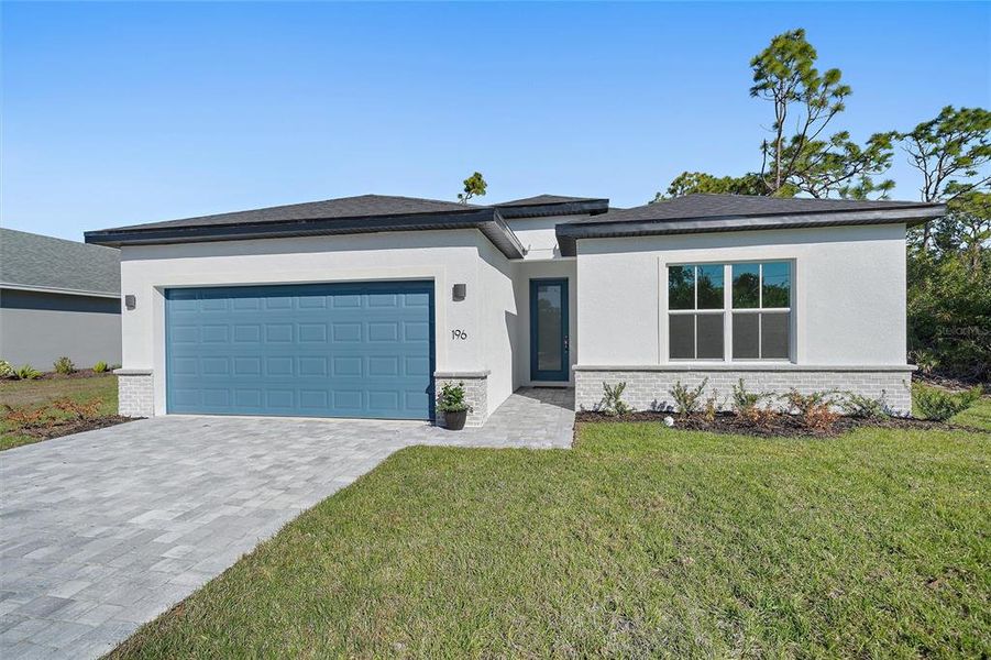 Front exterior of a new home in , Rotonda West, FL, highlighting curb appeal (Image 25). Front exterior of a new home in , Rotonda West, FL, highlighting curb appeal (Image 25).