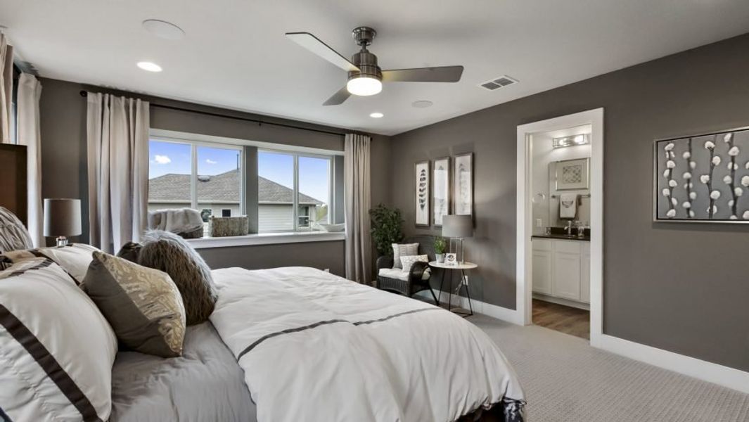 Representative furnished interior of a home built from the Houston by Pacesetter Homes in Village At Manor Commons, Manor (Image 15).