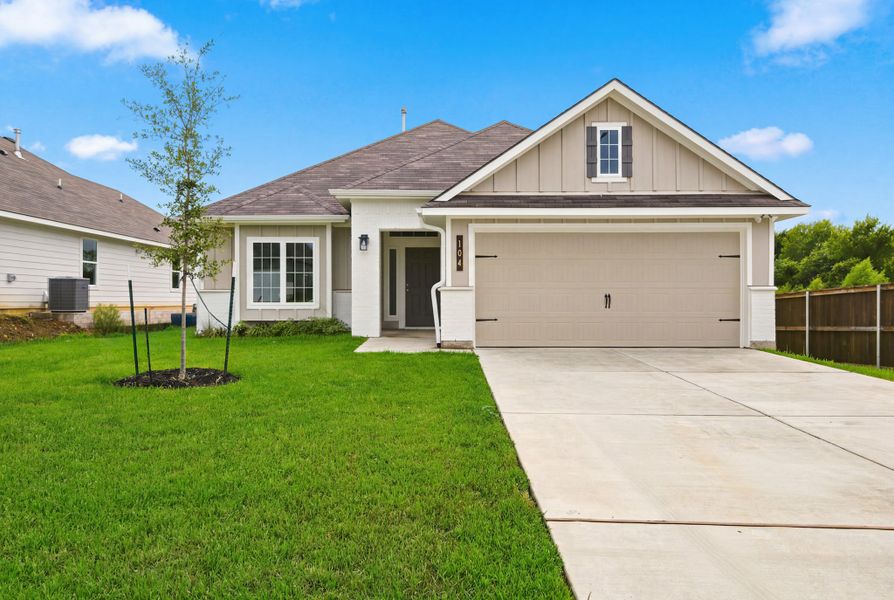 Front exterior of a new home in Arrowhead Farms, Caldwell, TX, highlighting curb appeal (Image 1). Front exterior of a new home in Arrowhead Farms, Caldwell, TX, highlighting curb appeal (Image 1).