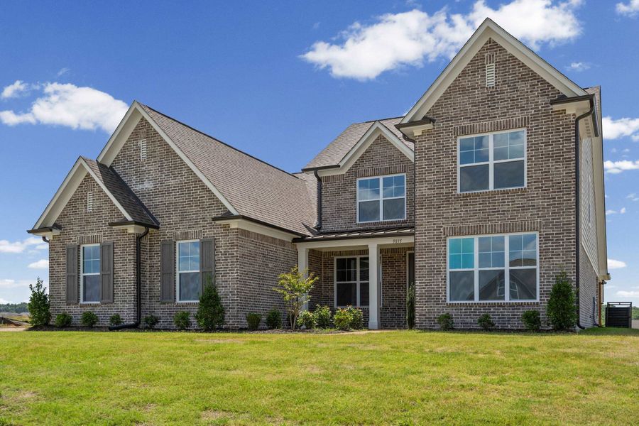 Front exterior of a new home in White Oak, Arlington, TN, highlighting curb appeal (Image 2). Front exterior of a new home in White Oak, Arlington, TN, highlighting curb appeal (Image 2).