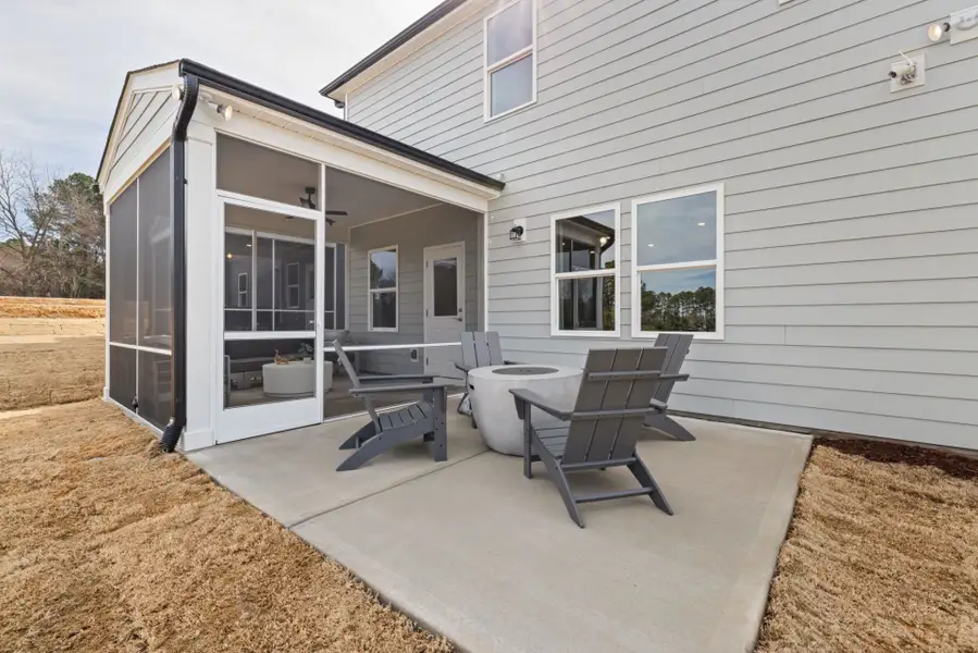 Exterior details and patio area of a home in Huxley, Apex (Image 3). Exterior details and patio area of a home in Huxley, Apex (Image 3).