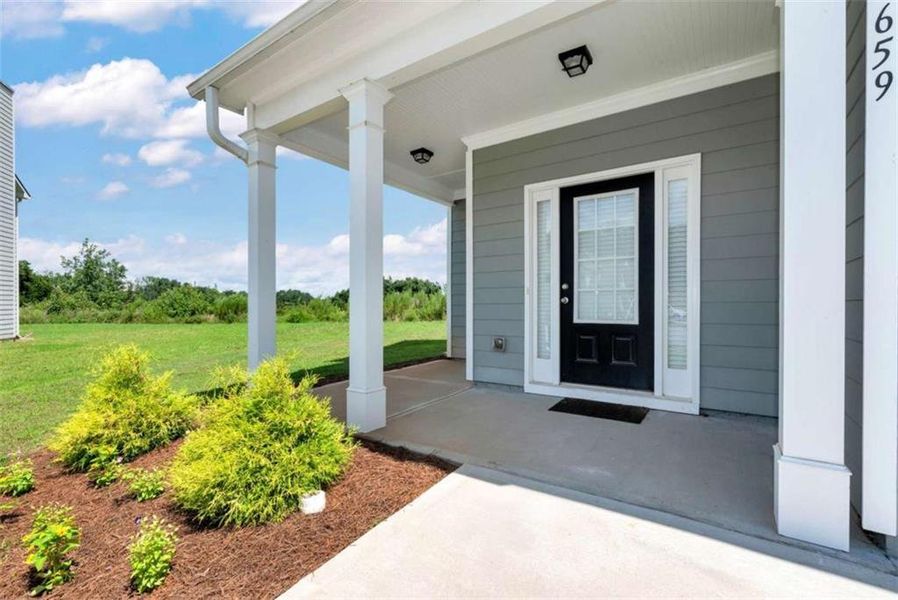 Front exterior of a new home in , Commerce, GA, highlighting curb appeal (Image 26).