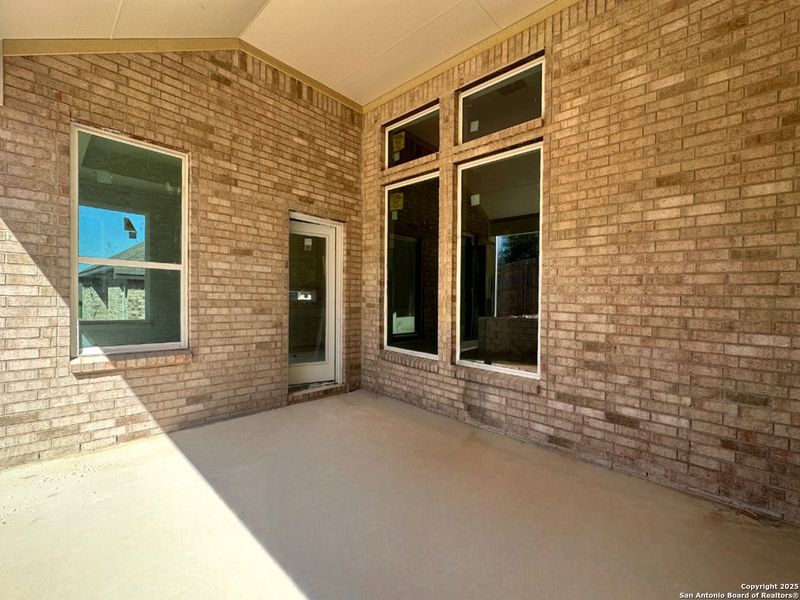 Exterior details and patio area of a home in Sunday Creek at Kinder Ranch, San Antonio (Image 4). Exterior details and patio area of a home in Sunday Creek at Kinder Ranch, San Antonio (Image 4).