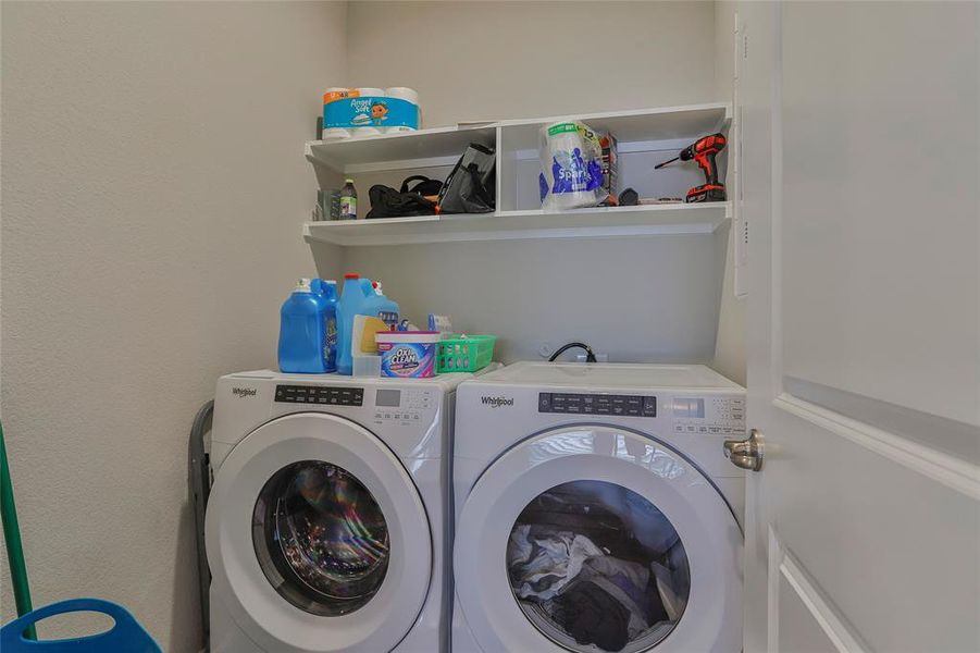Laundry area featuring independent washer and dryer Laundry area featuring independent washer and dryer