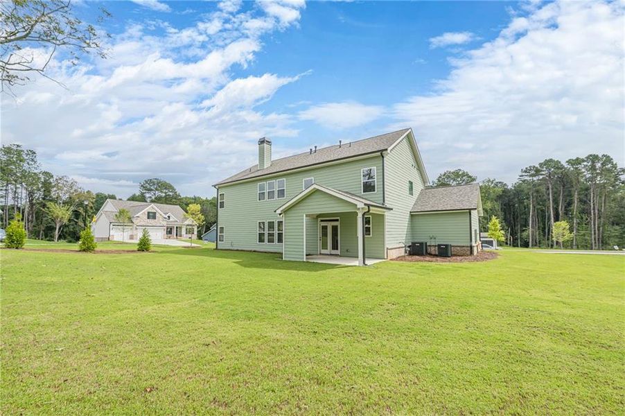 Exterior details and patio area of a home in , Loganville (Image 29).