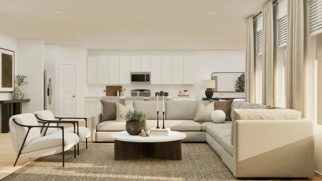 Furnished family room with view of open kitchen Furnished family room with view of open kitchen