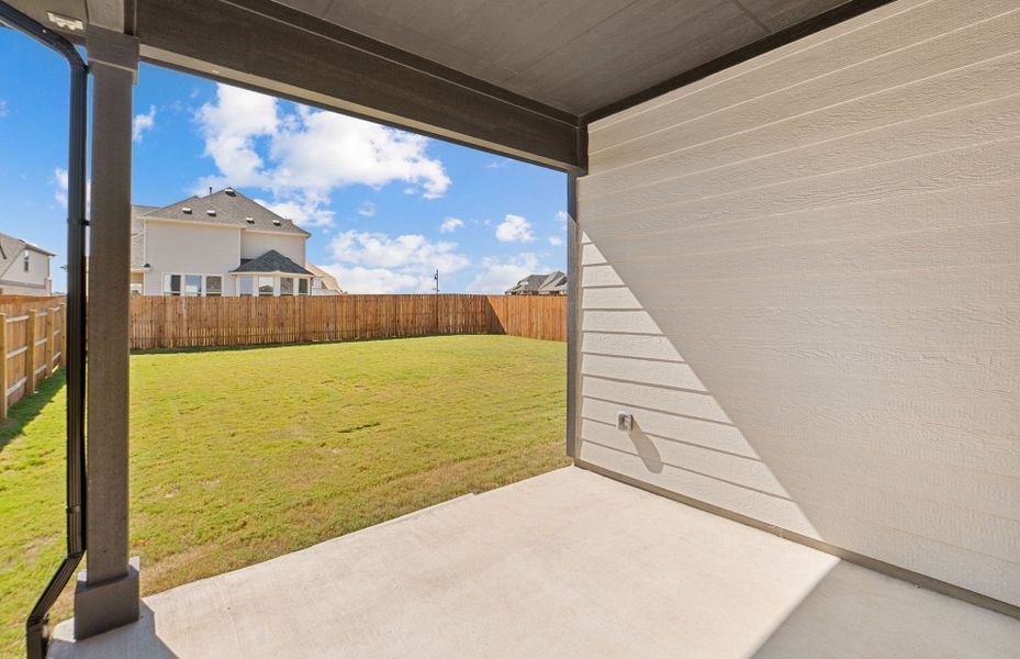 Exterior details and patio area of a home in Saddleback at Santa Rita Ranch, Liberty Hill (Image 26). Exterior details and patio area of a home in Saddleback at Santa Rita Ranch, Liberty Hill (Image 26).