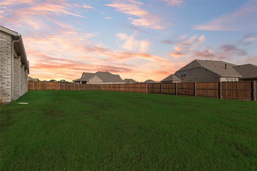 Front exterior of a new home in Lincoln Pointe, Van Alstyne, TX, highlighting curb appeal (Image 22). Front exterior of a new home in Lincoln Pointe, Van Alstyne, TX, highlighting curb appeal (Image 22).