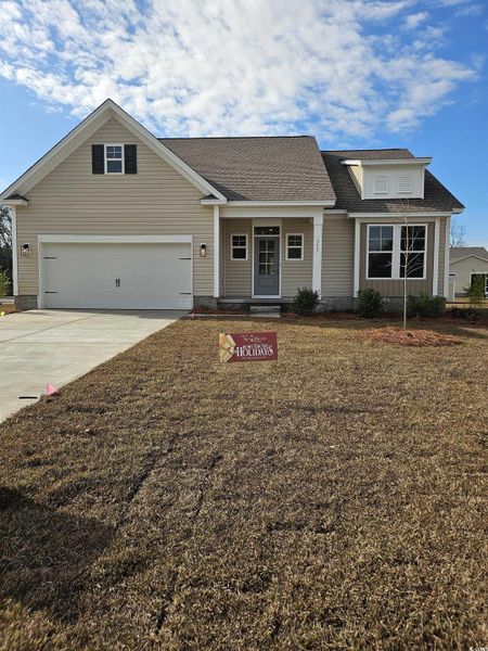 Front exterior of a new home in Grissett Landing, Conway, SC, highlighting curb appeal (Image 1).