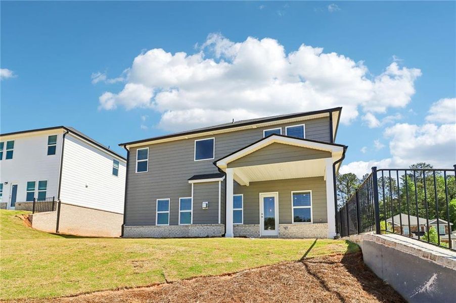 Exterior details and patio area of a home in Harmony Manor, Fairburn (Image 35). Exterior details and patio area of a home in Harmony Manor, Fairburn (Image 35).