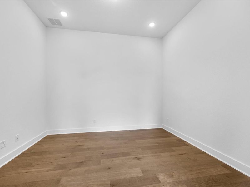 Spacious, unfurnished interior of a new home in The Estates at James Lane, Fulshear (Image 18).