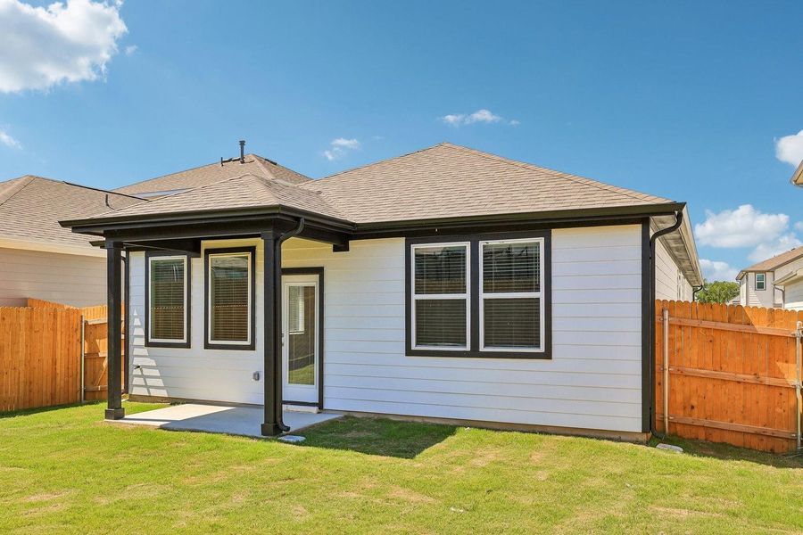Exterior details and patio area of a home in Trinity Ranch, Elgin (Image 25).