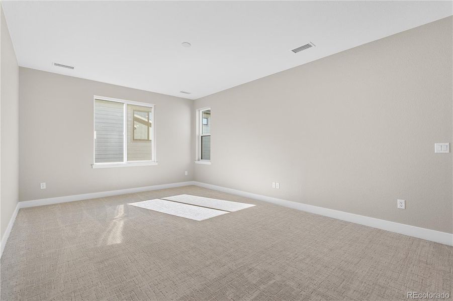 Spacious, unfurnished interior of a new home in Legends at Lyric, Lone Tree (Image 22).