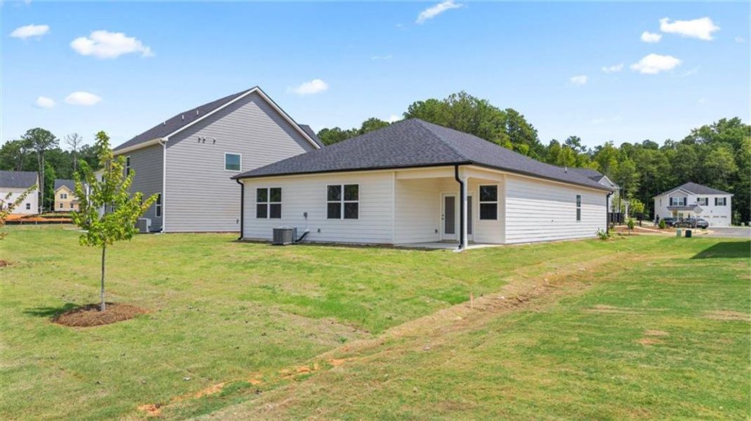 Exterior details and patio area of a home in Oakchase at Hampton, Hampton (Image 3).