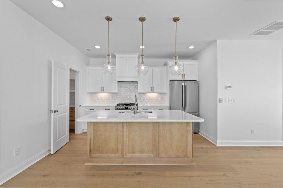 Representative furnished interior of a home built from the The Juniper by RobuckHomes in Kennebec Crossing, Angier (Image 8).