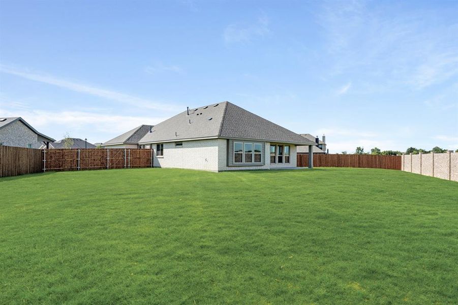 Front exterior of a new home in Hunters Ridge, Crowley, TX, highlighting curb appeal (Image 1). Front exterior of a new home in Hunters Ridge, Crowley, TX, highlighting curb appeal (Image 1).