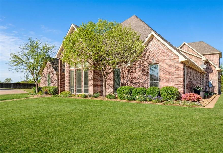 Front exterior of a new home in , Paris, TX, highlighting curb appeal (Image 22). Front exterior of a new home in , Paris, TX, highlighting curb appeal (Image 22).