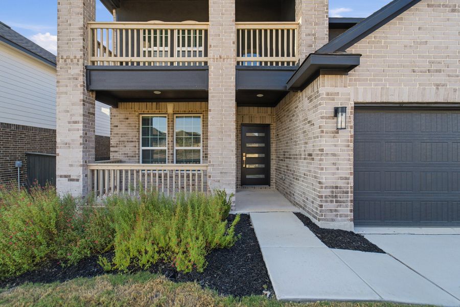Exterior details and patio area of a home in The Woodlands at Medina Hills, Mico (Image 3). Exterior details and patio area of a home in The Woodlands at Medina Hills, Mico (Image 3).