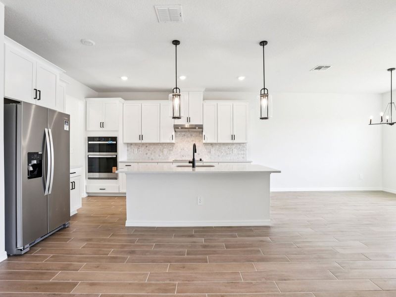Furnished interior view inside a new home in Two Rivers - Signature Series, Zephyrhills (Image 6).