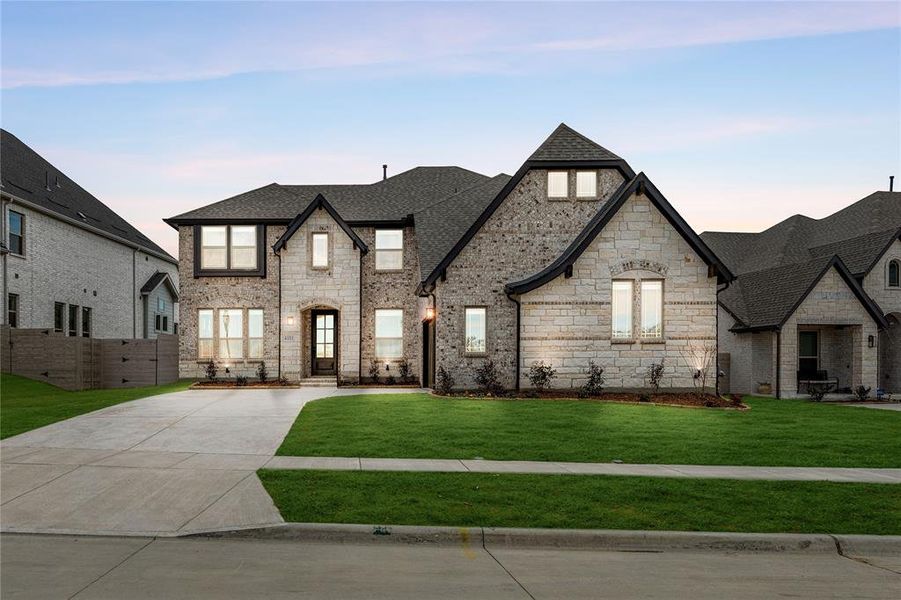 Front exterior of a new home in Painted Tree, McKinney, TX, highlighting curb appeal (Image 26).