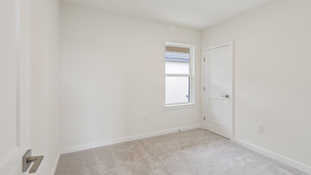 Furnished interior view inside a new home in Grasslands West, Lakeland (Image 31).