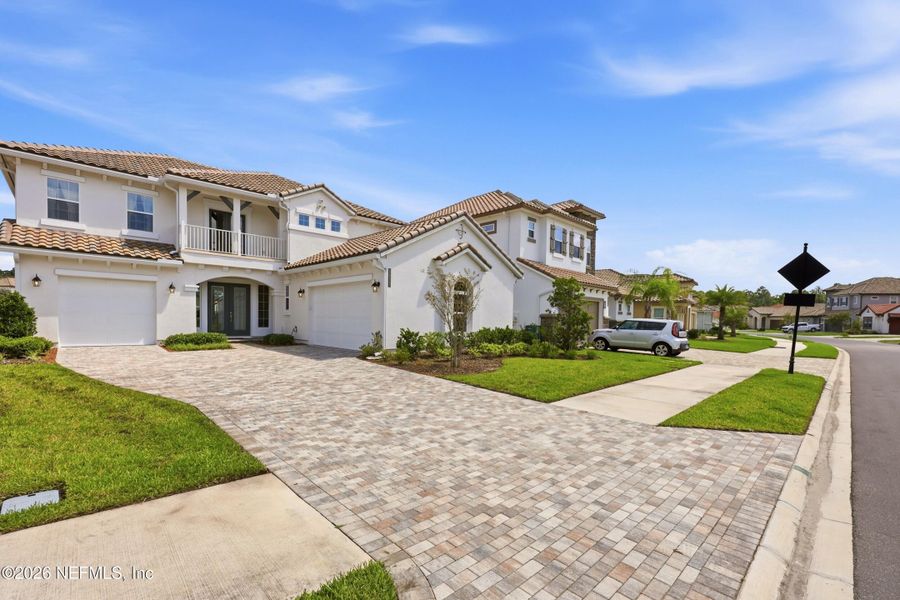 Front exterior of a new home in Tamaya, Jacksonville, FL, highlighting curb appeal (Image 1). Front exterior of a new home in Tamaya, Jacksonville, FL, highlighting curb appeal (Image 1).