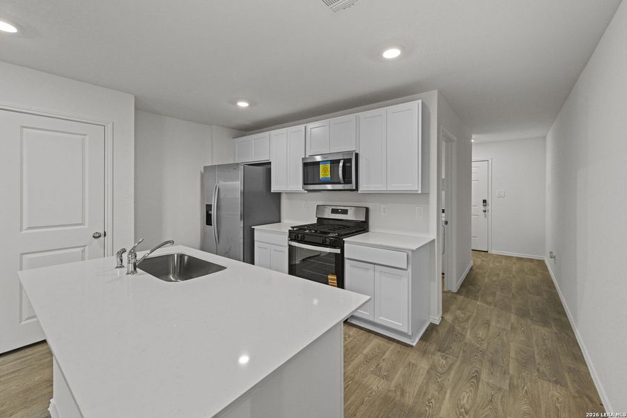 Furnished interior view inside a new home in Hickory Ridge, Elmendorf (Image 11).