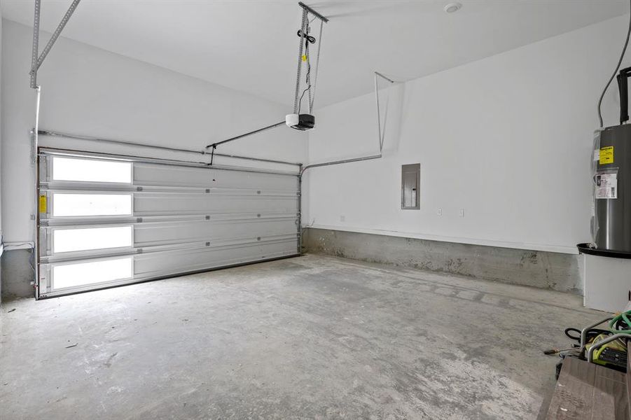 Garage with a garage door opener and electric panel