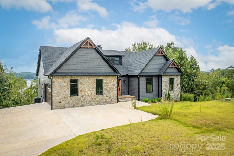Front exterior of a new home in , Nebo, NC, highlighting curb appeal (Image 2).