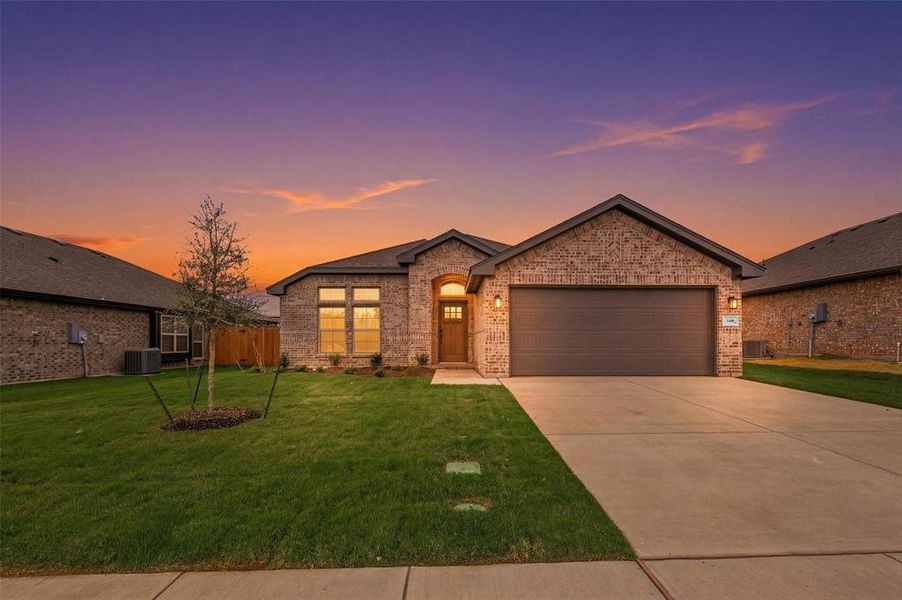 Front exterior of a new home in Trail Creek, Cleburne, TX, highlighting curb appeal (Image 1). Front exterior of a new home in Trail Creek, Cleburne, TX, highlighting curb appeal (Image 1).