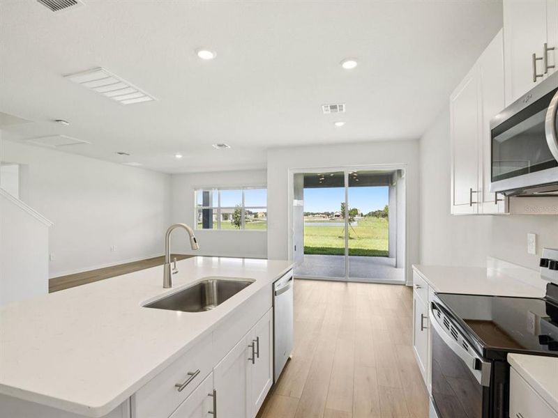 Furnished interior view inside a new home in Coasterra - Reserve Series, Palmetto (Image 14).