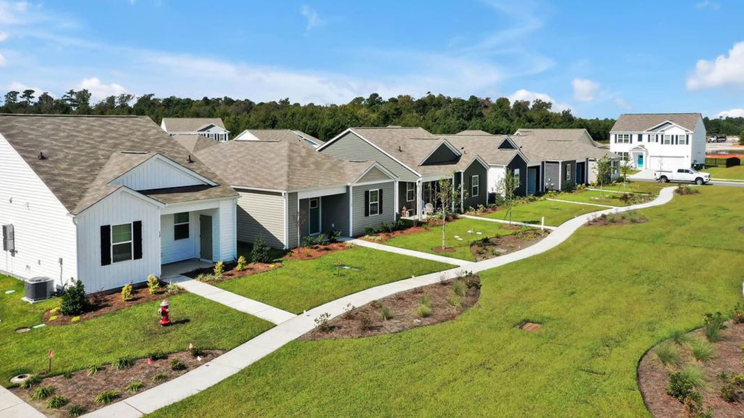 Representative exterior photo of a completed home built from the CURTIS by D.R. Horton in The Cottages at Blake Farm, Wilmington, NC (Image 5). Representative exterior photo of a completed home built from the CURTIS by D.R. Horton in The Cottages at Blake Farm, Wilmington, NC (Image 5).